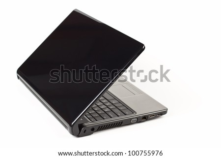black laptop half open rear view isolated on white background