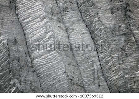 Basalt rock formations "Troll toes" on black beach. Reynisdrangar, Vik, Iceland
