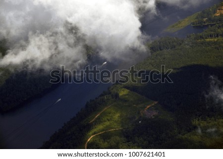 Aerial view of river with clouds 