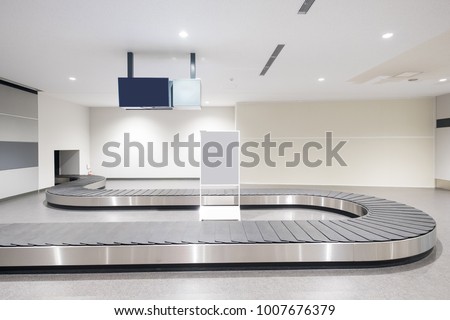 Baggage conveyor belt at the airport in the japan Royalty-Free Stock Photo #1007676379