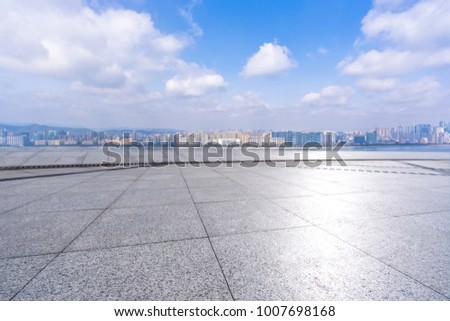 empty marble floor with cityscape