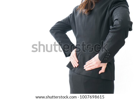 businesswoman suffering from backache