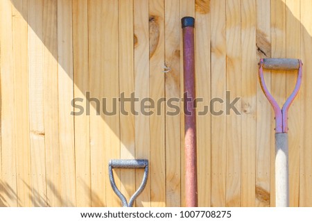 Gardening tools and wood wall backgrounds