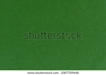 green paper background
