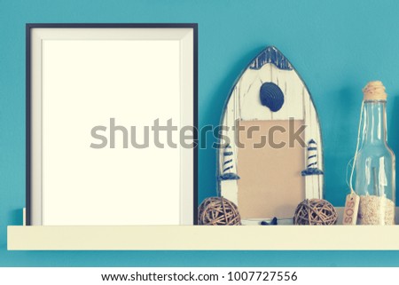 Poster frame mock up template with summer home decor on wooden table