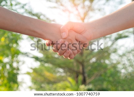 Business man handshake to partner, concept of agreement, teamwork and welcome.