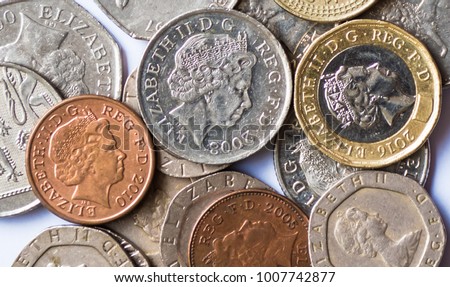 British coins on white backgrounds, British coins. Royalty-Free Stock Photo #1007742877