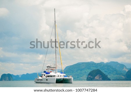 luxury white yacht horizontal picture on the background of mountains