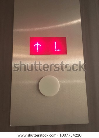Red Digital Elevator Lobby Arrow Icon and Sign