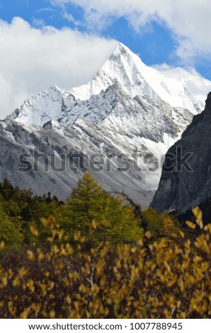 Snowy mountain peak in Yading National Reserve in autumn, Sichuan, China