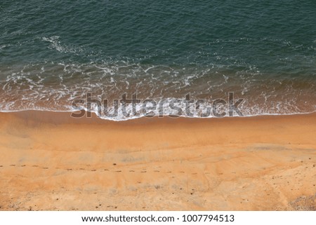 Abstract image of soft wave in a sandy beach