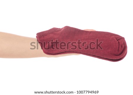 Cotton socks in hands on a white background isolation