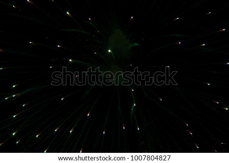 Firework. Celebratory bright firework in a night sky. Fireworks in the night sky of Moscow colorful. Colorful fireworks on the black sky. 