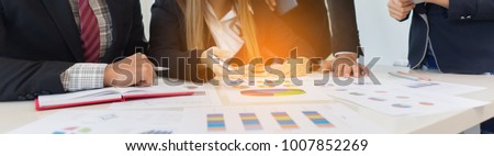 business concept, people working on tablet computer with digital data  on device screen discussion and analysis data in meeting room office.for Banner Royalty-Free Stock Photo #1007852269