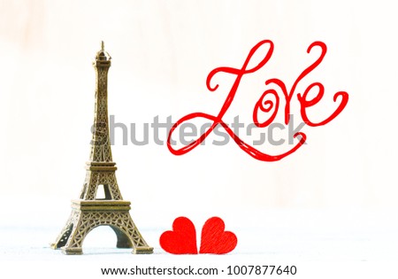 Eiffel tower and red hearts - Valentine`s Day concept