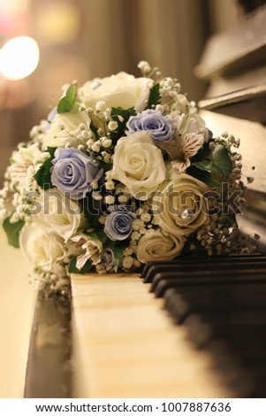 Wedding Attributes and Accessories. Bridal bouquet and champagne glasses.