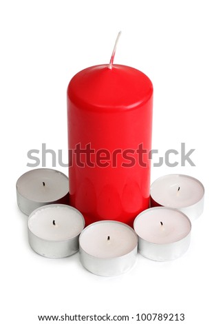 Color photo of candles on a wooden table
