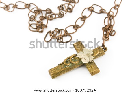 Golden christian cross with chain isolated on white