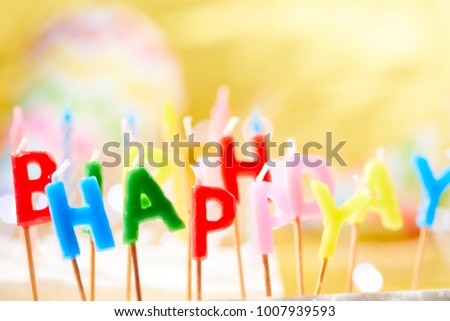 birthday candles on yellow background