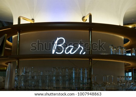 Bar Sign With Glowing Letters. High Resolution Image.