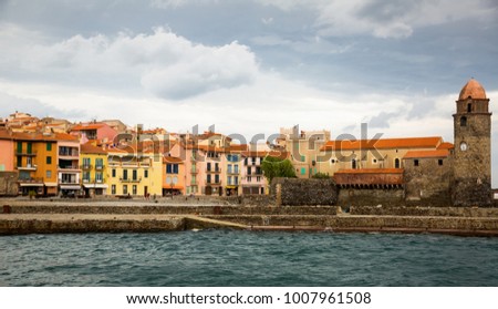 Church of Notre-Dame de Anges and promenade in picturesque harbor of Collioure