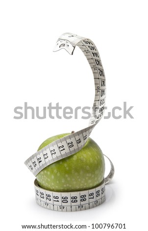 Tape measure simulating a snake wrapped around an apple.