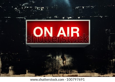 ON AIR board message is lit on in studio Royalty-Free Stock Photo #100797691