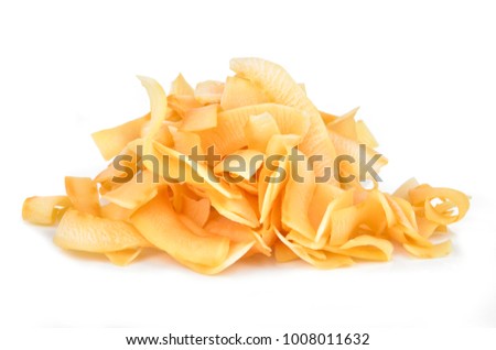 Coconut chips on a white background Royalty-Free Stock Photo #1008011632