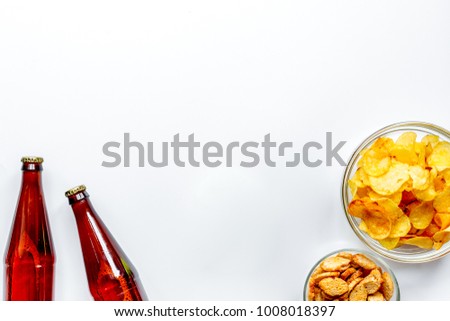 watching sport match set with chips on white background top view