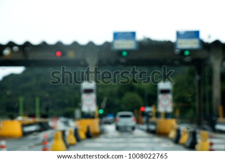 Blurry view of a Toll plaza in a road in Brazil. Bokeh