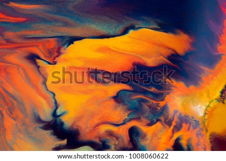 Colorful paint background in concept Fantasy luxury texture. Colors dropped into liquid and photographed while in motion. abstract composition. Royalty-Free Stock Photo #1008060622