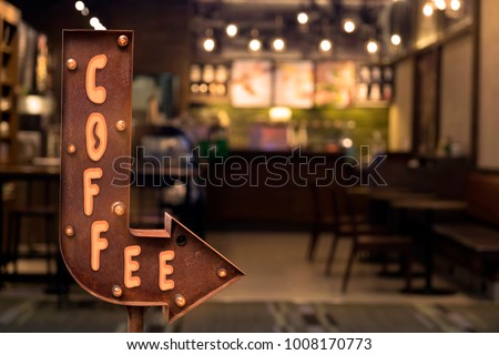 Coffee shop signboard, in front of the store