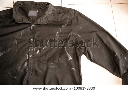 Black shirt with sweat stains