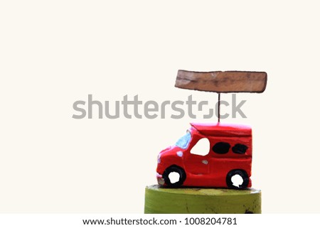 Red Little model car with Wooden sign over the car isolated on white background