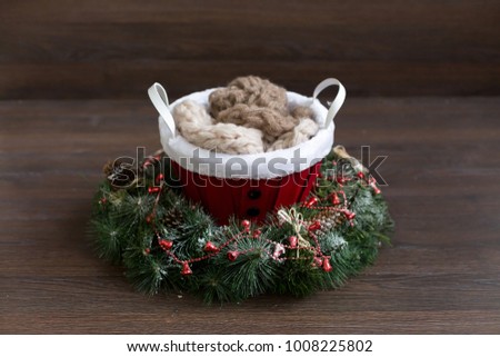 Christmas decor. Bucket, garlands and a Christmas wreath like Santa. Christmas decor. Bucket Christmas
