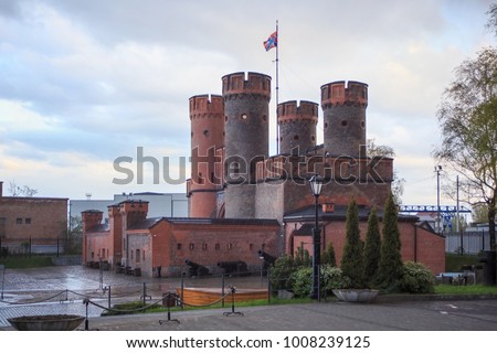 The neo-gothic gate of the fortress Friedrichsburg in Kaliningrad (Konigsberg), Russia. The gate was built from burnt-out bricks in 1852 and is the only surviving element of the former german fortress Royalty-Free Stock Photo #1008239125