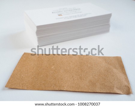 Business cards on a light background.