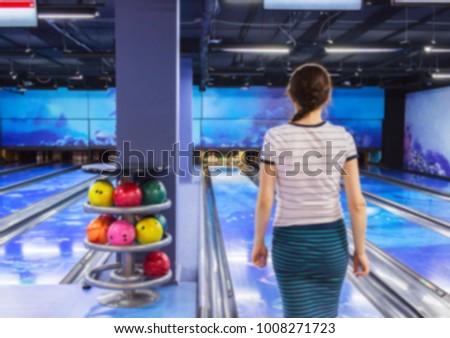 Defocused activity bowling girl sport blur background.