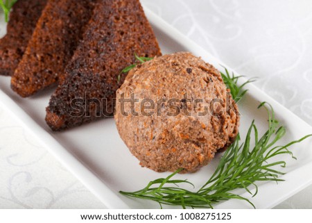 Liver spreas with bread and pickled cucumbers