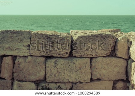 Old ruins of a brick- stone walls of the ancient city. National archaeological park.