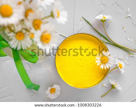 Bright yellow colour for Indian holi festival. Colorful gulal (powder color) for Happy Holi. Royalty-Free Stock Photo #1008303226