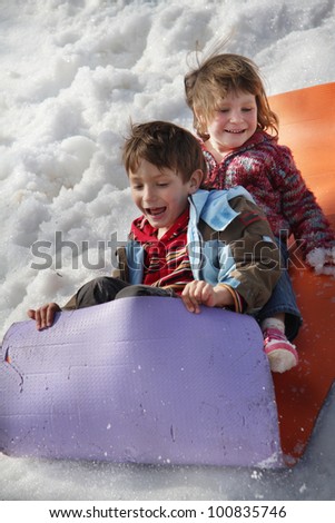 children having fun in snow