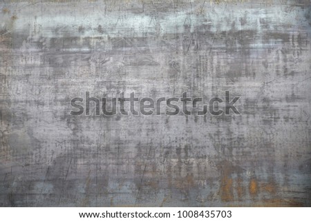 Grunge dust and scratched background metal texture.
