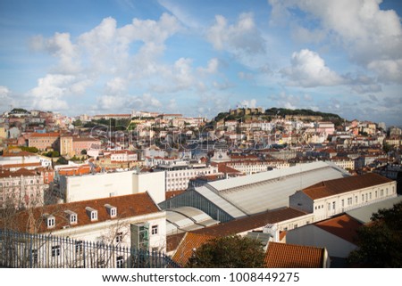 Panoramic view of Lisbon,Portugal town center form the of the many viewpoints parks.Architecture and culture in Europe.Beautiful view form the miradouro to the old town and St Jorge castle