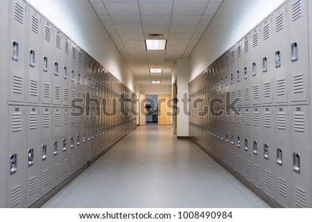 School hallway with lockers Royalty-Free Stock Photo #1008490984
