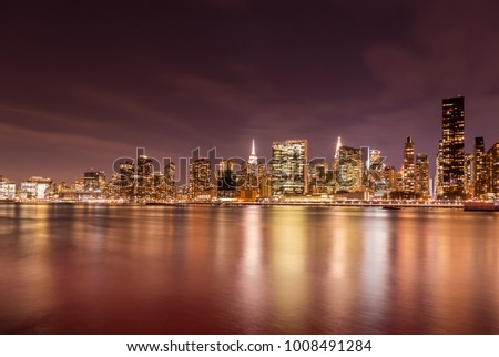 Long exposure of the Manhattan skyline taken at night from Gantry Park Queens. I used a warmer setting for this shot