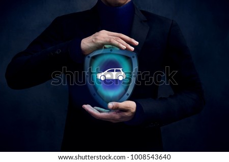 Car Insurance Company Safe and Supporting Customer Concept, Automobile icon inside a Shield Guard Protected and Careful Gesture Hands of Businessman