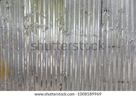 Surface of zinc fence is dirty for the design background or backdrop in your work.