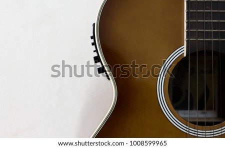 Part of acoustic guitar for backgrounds or textures.