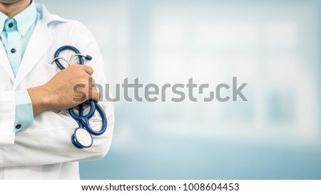 Doctor in hospital background with copy space. Healthcare and medical concept. Royalty-Free Stock Photo #1008604453